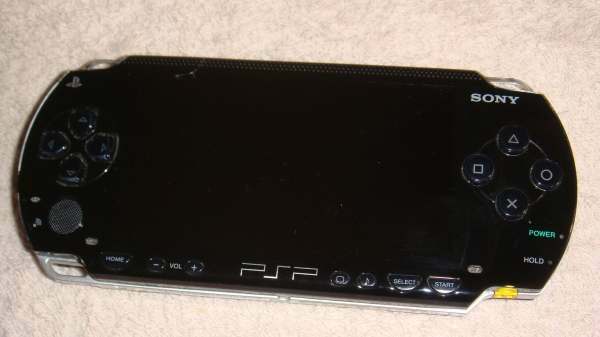 Psp slim noire superbe état !