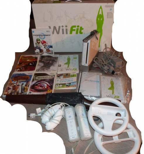 vends wii avec balance wii fit; jeux; manette: volant; etc.